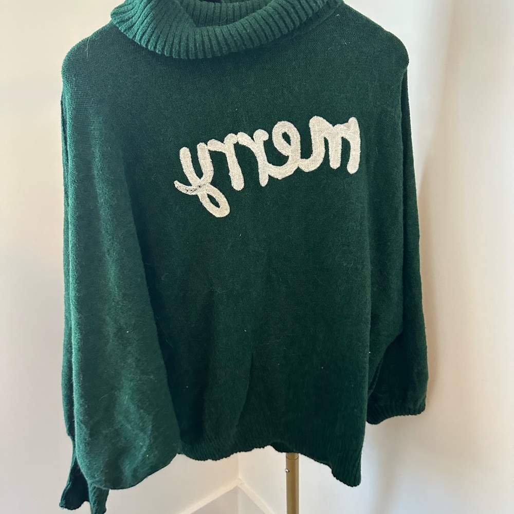 Green Turtleneck Sweater with White Lettering